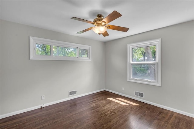 4203 E 113th St, Kansas City, MO 64137 - unfurnished room with baseboards, wood finished floors, and ceiling fan