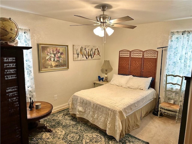 11305 E Winner Rd, Independence, MO 64052 - bedroom featuring a textured wall, ceiling fan, and baseboards