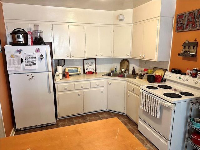 11305 E Winner Rd, Independence, MO 64052 - kitchen with white appliances, a sink, light countertops, and white cabinets