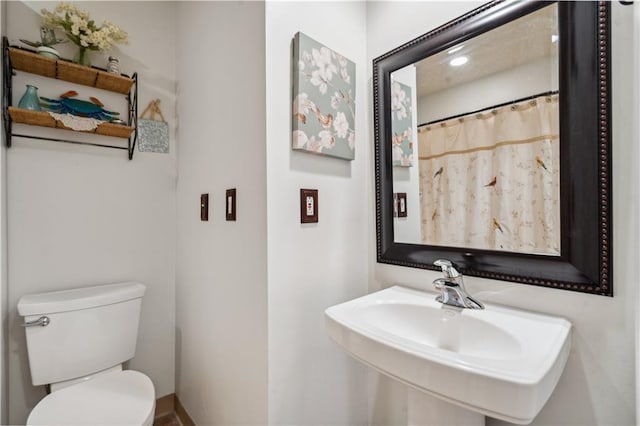 2113 N 155th St, Basehor, KS 66007 - bathroom featuring toilet and a sink