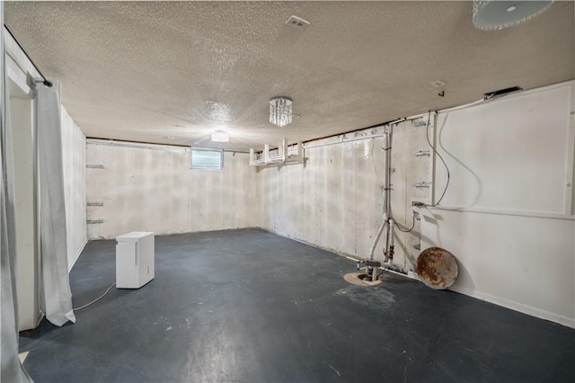 2113 N 155th St, Basehor, KS 66007 - below grade area with a textured ceiling