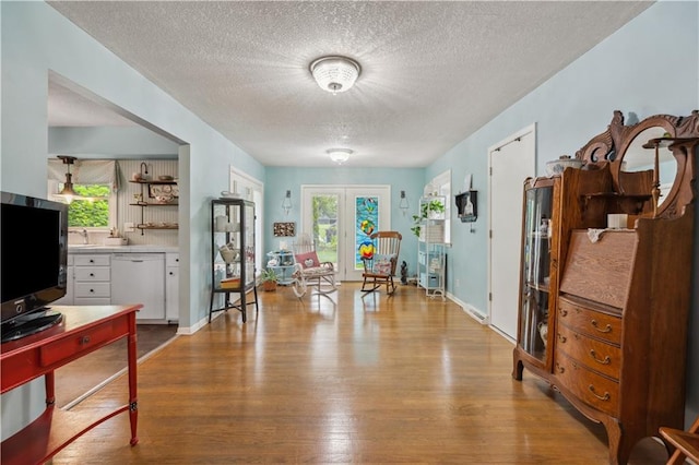 2113 N 155th St, Basehor, KS 66007 - dining room with a textured ceiling and wood finished floors
