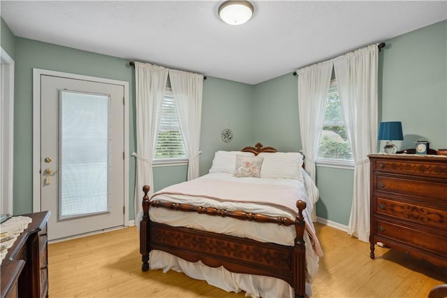 2113 N 155th St, Basehor, KS 66007 - bedroom with light wood-style flooring and baseboards
