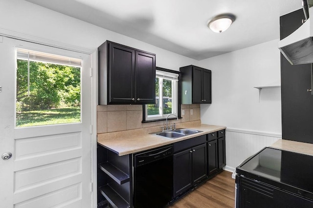 2729 S 52nd St, Kansas City, KS 66106 - kitchen with black appliances, a sink, open shelves, light countertops, and plenty of natural light