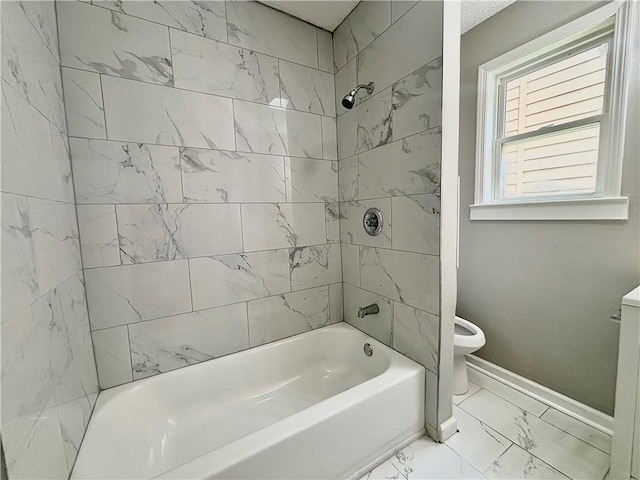 2243 Spruce Ave, Kansas City, MO 64127 - bathroom with toilet, marble finish flooring, shower / washtub combination, and baseboards