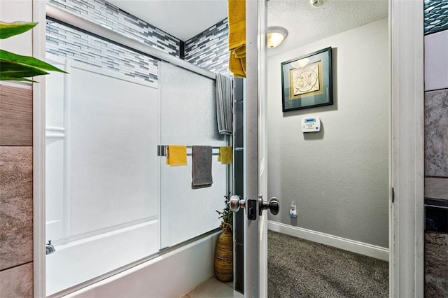 9504 E 89th St, Kansas City, MO 64138 - full bathroom with shower / bath combination with glass door and baseboards