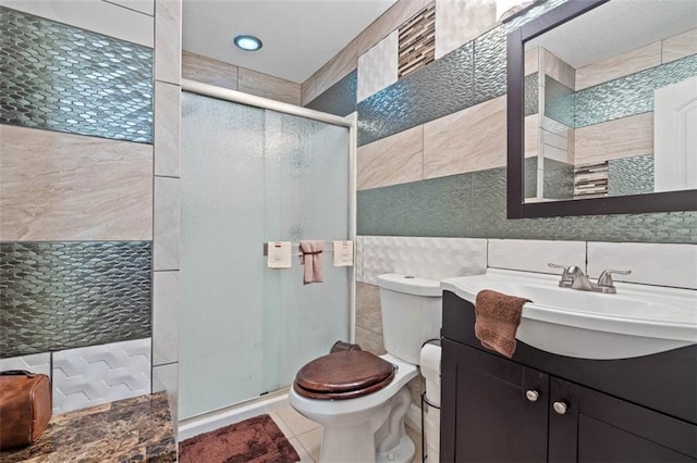 9504 E 89th St, Kansas City, MO 64138 - bathroom featuring tile walls, toilet, a stall shower, vanity, and tasteful backsplash
