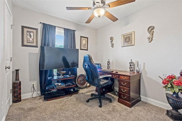9504 E 89th St, Kansas City, MO 64138 - carpeted home office with a ceiling fan and baseboards