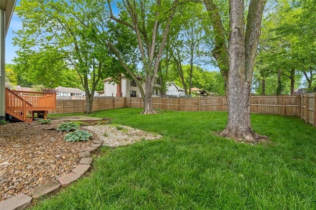 9504 E 89th St, Kansas City, MO 64138 - view of yard featuring a wooden deck