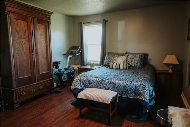 7164 State Route T Hwy, Amazonia, MO 64421 - bedroom with wood finished floors and a textured ceiling