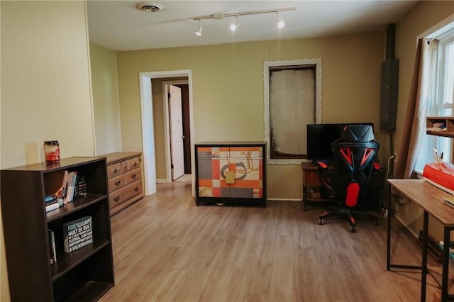7166 State Route T Hwy, Amazonia, MO 64421 - office featuring electric panel, wood finished floors, and rail lighting