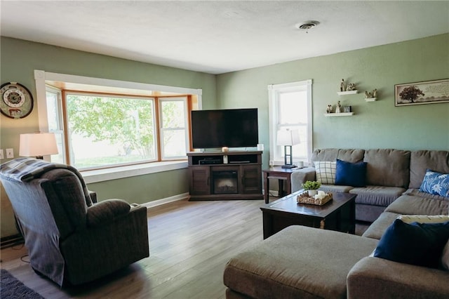 7166 State Route T Hwy, Amazonia, MO 64421 - living room featuring wood finished floors and baseboards