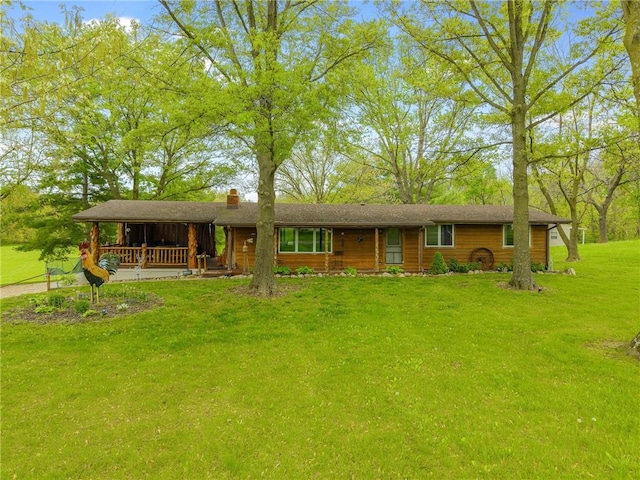 13813 Petty Rd, Kearney, MO 64060 - ranch-style home with a chimney, covered porch, and a front yard