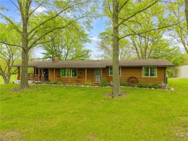 13813 Petty Rd, Kearney, MO 64060 - ranch-style home featuring a porch, a chimney, and a front lawn