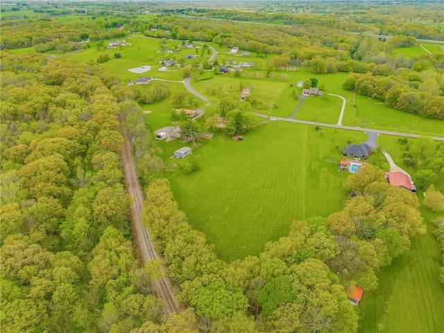 13813 Petty Rd, Kearney, MO 64060 - drone / aerial view with a rural view and a wooded view