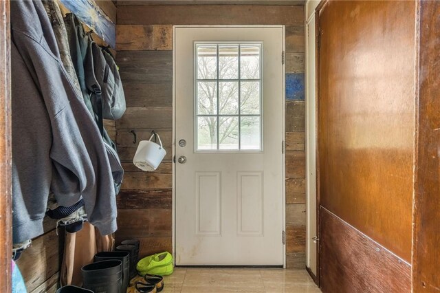 13813 Petty Rd, Kearney, MO 64060 - entryway with plenty of natural light and wooden walls