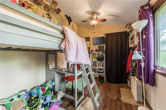 13813 Petty Rd, Kearney, MO 64060 - bedroom featuring wood finished floors, lofted ceiling, and ceiling fan