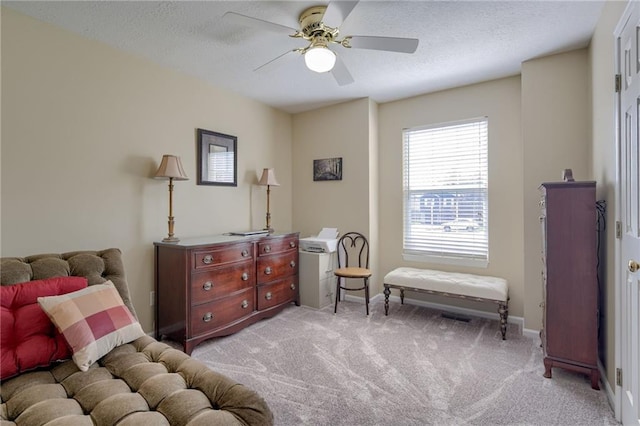748 SW Windsong Cir, Lees Summit, MO 64082 - bedroom with light carpet, baseboards, a textured ceiling, and ceiling fan