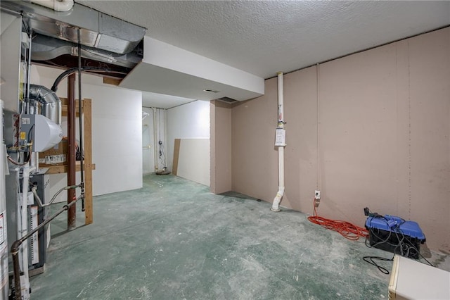 748 SW Windsong Cir, Lees Summit, MO 64082 - finished below grade area featuring a textured ceiling