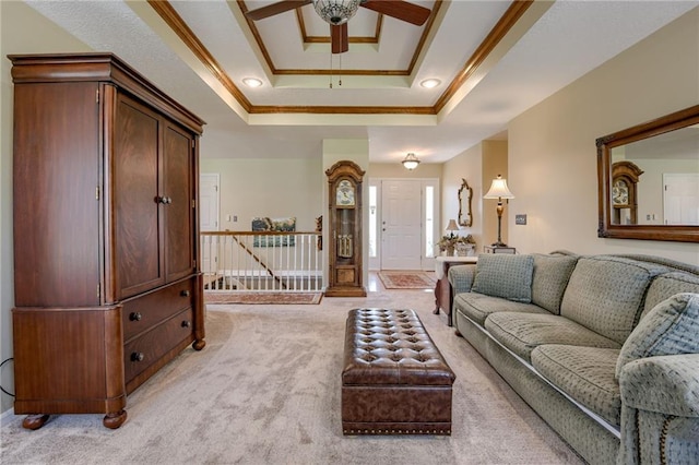 748 SW Windsong Cir, Lees Summit, MO 64082 - living room featuring light colored carpet, ceiling fan, crown molding, a raised ceiling, and baseboards
