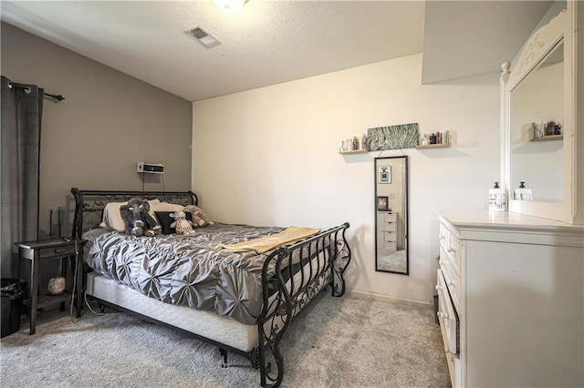 bedroom with light colored carpet