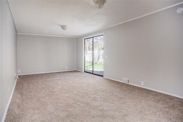 110 S Park Ave, Independence, MO 64050 - empty room with carpet, baseboards, crown molding, and a textured ceiling
