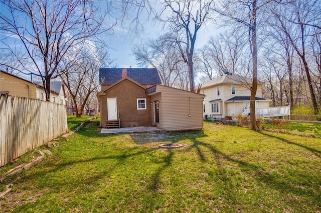 110 S Park Ave, Independence, MO 64050 - rear view of property with entry steps, a fire pit, and a chimney
