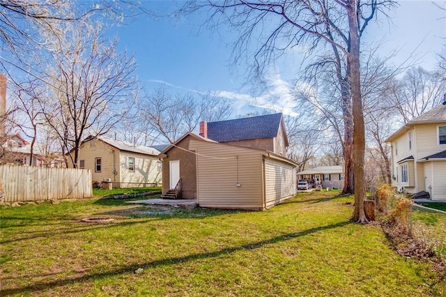 110 S Park Ave, Independence, MO 64050 - rear view of house with entry steps and a chimney