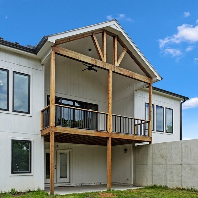 28897 Hackberry Cir, Paola, KS 66071 - rear view of house with a ceiling fan