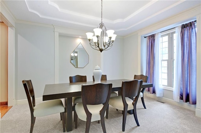 6330 N Nevada Ave, Parkville, MO 64152 - dining room with a chandelier, plenty of natural light, a raised ceiling, and ornamental molding
