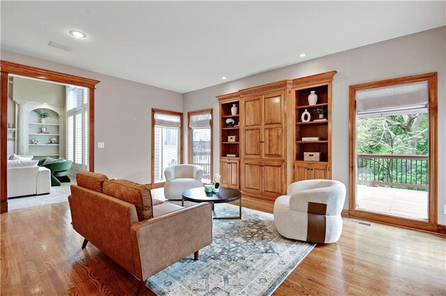 6330 N Nevada Ave, Parkville, MO 64152 - living room featuring light wood-style flooring and recessed lighting