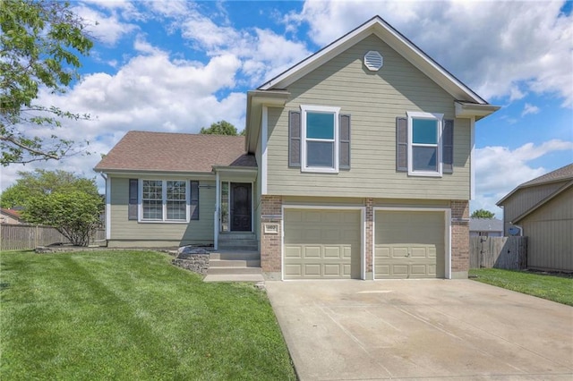 1102 Manse Dr, Raymore, MO 64083 - tri-level home featuring brick siding, a garage, and concrete driveway