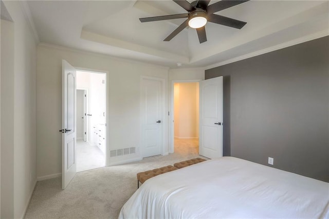 1102 Manse Dr, Raymore, MO 64083 - bedroom with a raised ceiling, carpet flooring, ceiling fan, ornamental molding, and baseboards