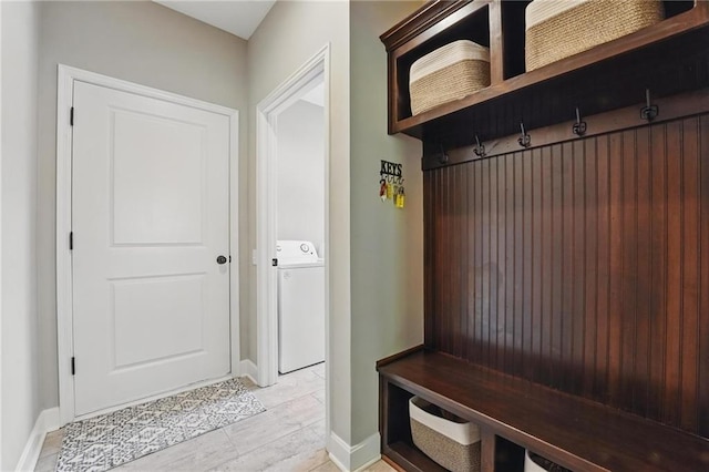 17311 Blue Moon Ln, Tonganoxie, KS 66086 - mudroom featuring washer / dryer and baseboards