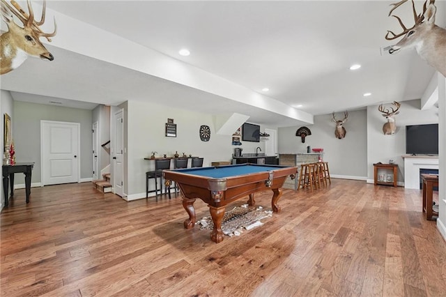 17311 Blue Moon Ln, Tonganoxie, KS 66086 - recreation room with wet bar, wood finished floors, billiards table, recessed lighting, and baseboards
