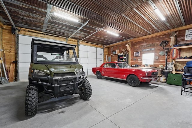 17311 Blue Moon Ln, Tonganoxie, KS 66086 - garage featuring wooden walls