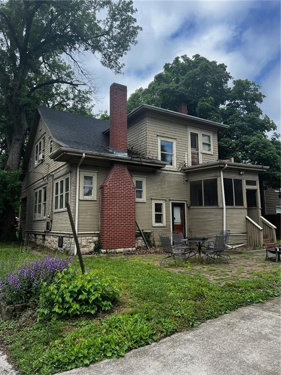315 W 4th St, Ottawa, KS 66067 - back of property featuring a chimney