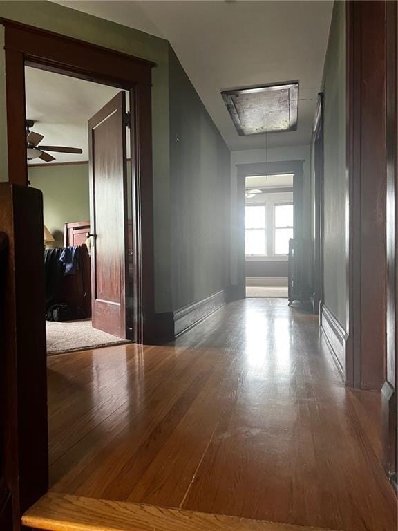 315 W 4th St, Ottawa, KS 66067 - corridor featuring wood finished floors and baseboards