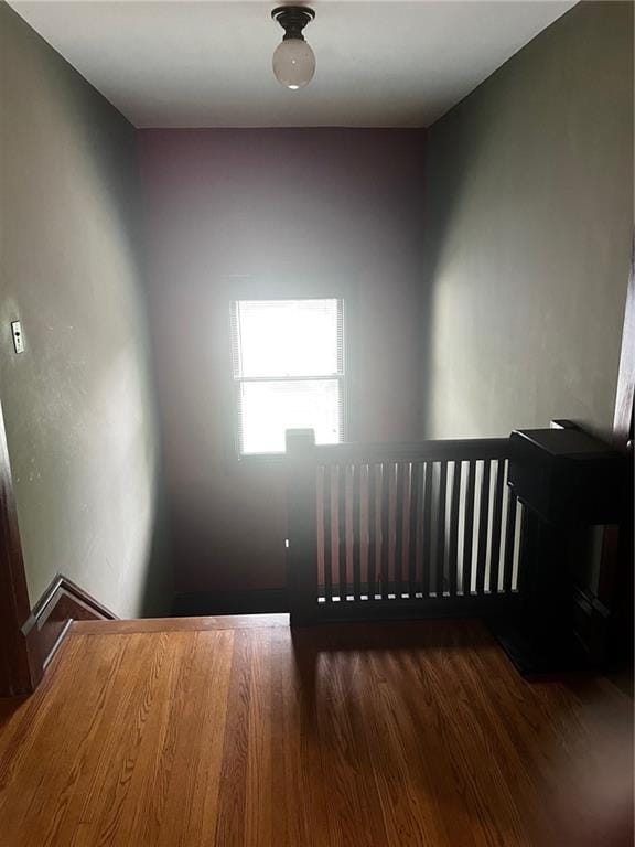 315 W 4th St, Ottawa, KS 66067 - stairs featuring wood finished floors
