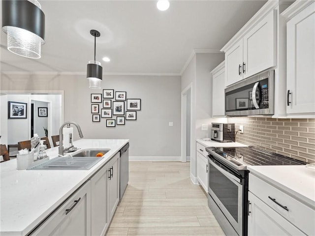 11382 S Longview Rd, Olathe, KS 66061 - kitchen featuring appliances with stainless steel finishes, light countertops, ornamental molding, tasteful backsplash, and white cabinets