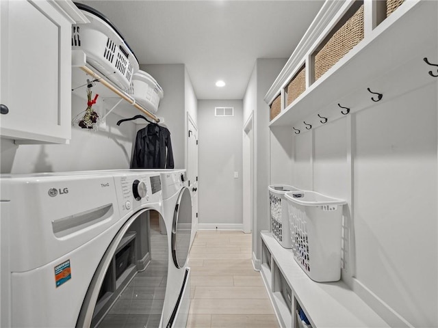 11382 S Longview Rd, Olathe, KS 66061 - laundry room featuring washing machine and dryer, recessed lighting, and cabinet space