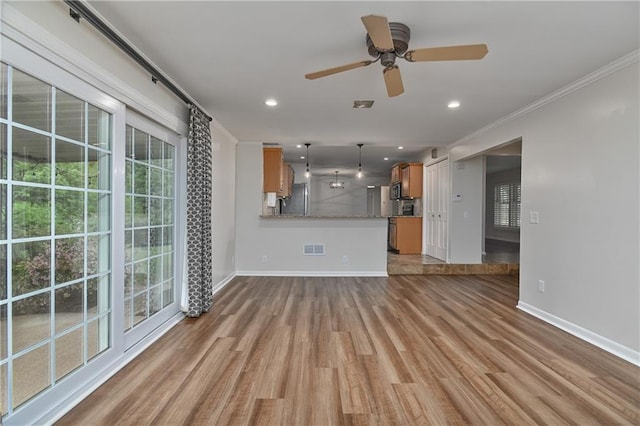 6411 Outlook Dr, Mission, KS 66202 - unfurnished living room featuring ornamental molding, baseboards, light wood-style floors, recessed lighting, and a ceiling fan