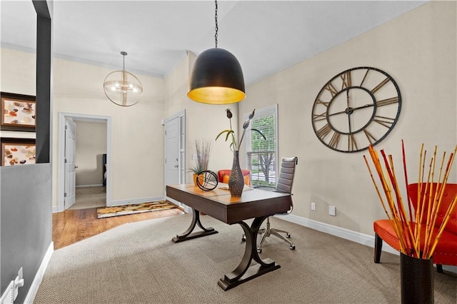 home office featuring baseboards and carpet