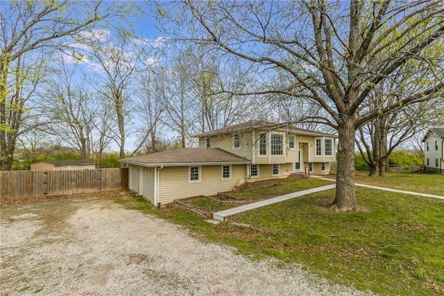 view of front of property featuring a gate