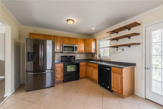 kitchen with black appliances, a sink, dark countertops, crown molding, and decorative backsplash