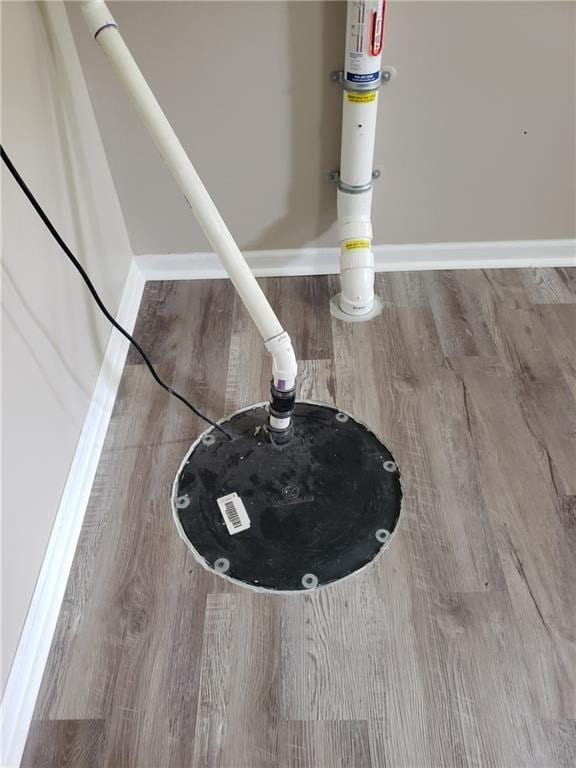 detailed view of wood finished floors and baseboards