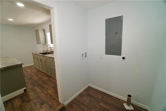 laundry area featuring hookup for an electric dryer, electric panel, hookup for a washing machine, dark wood finished floors, and recessed lighting
