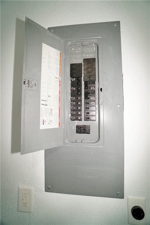 utility room with electric panel