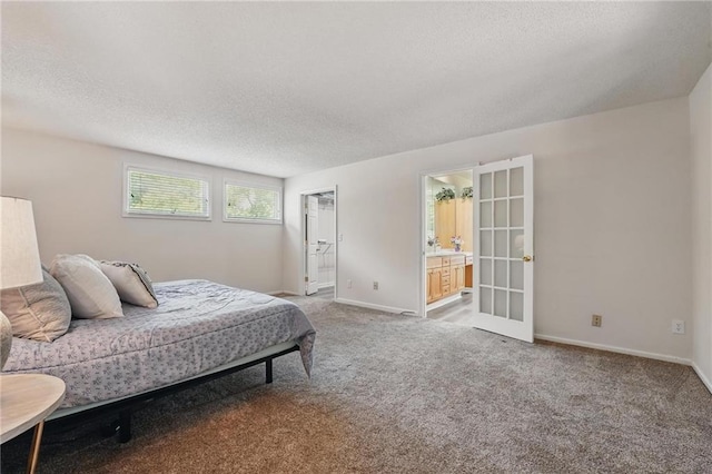 14927 S Caenen Ln, Olathe, KS 66062 - bedroom with a textured ceiling, light carpet, baseboards, and ensuite bath