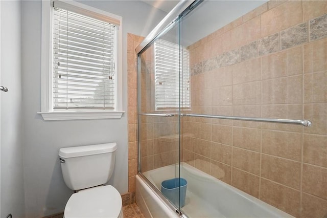 14927 S Caenen Ln, Olathe, KS 66062 - bathroom featuring enclosed tub / shower combo, toilet, and healthy amount of natural light